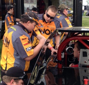 Michael Brookes speaks with stock car driver Brad Kemp before hot laps Friday at Limaland Motorsports Park