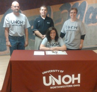 Bethany Pellman is joined by parents John Pellman and Angie Brocious and UNOH assistant coach Dave Jeanneret