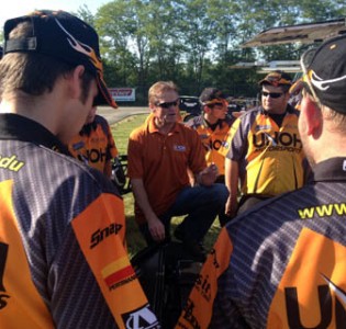 NASCAR great Kenny Wallace talks with UNOH motorsports team members prior to racing Friday at Limaland Motorsports Park